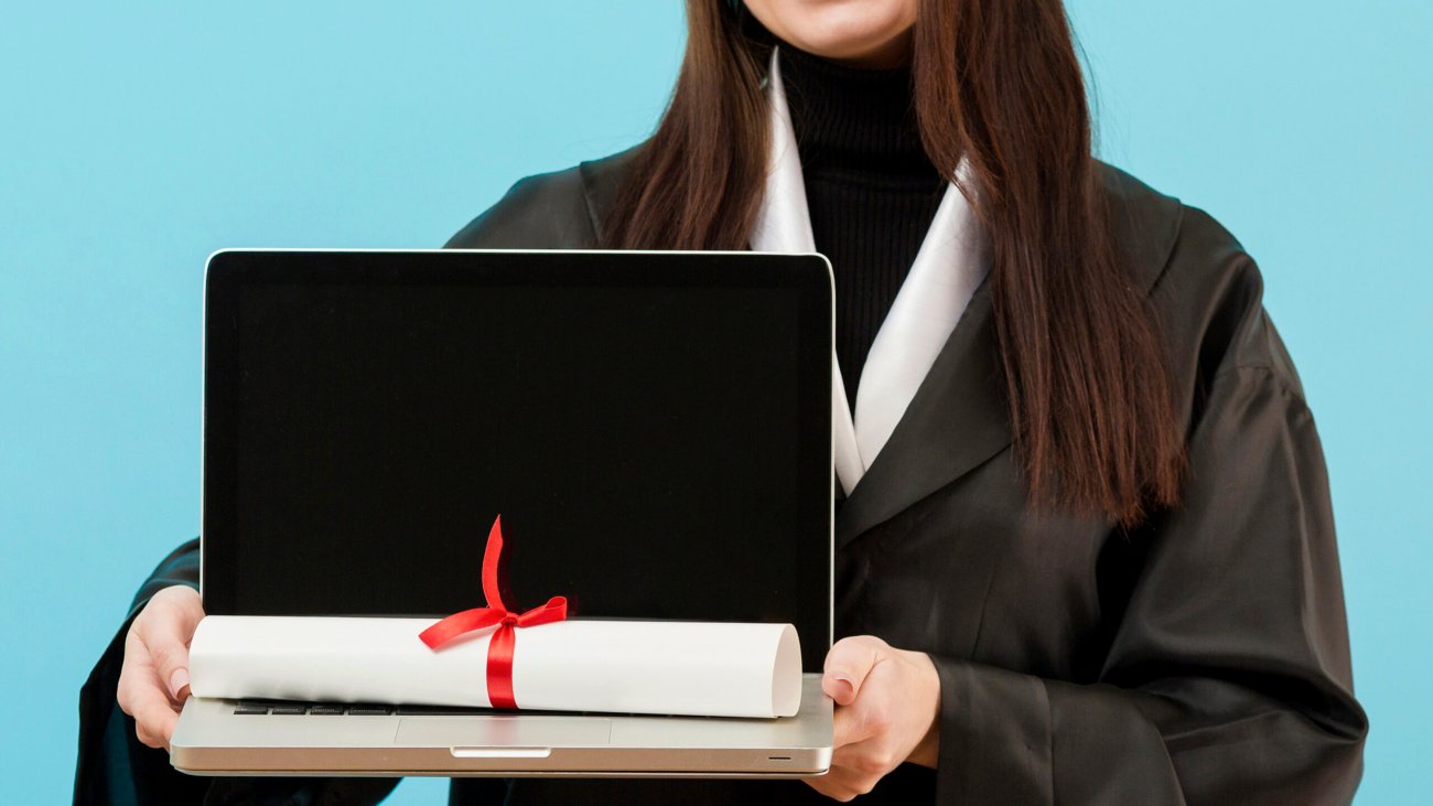 close-up-girl-holding-laptop