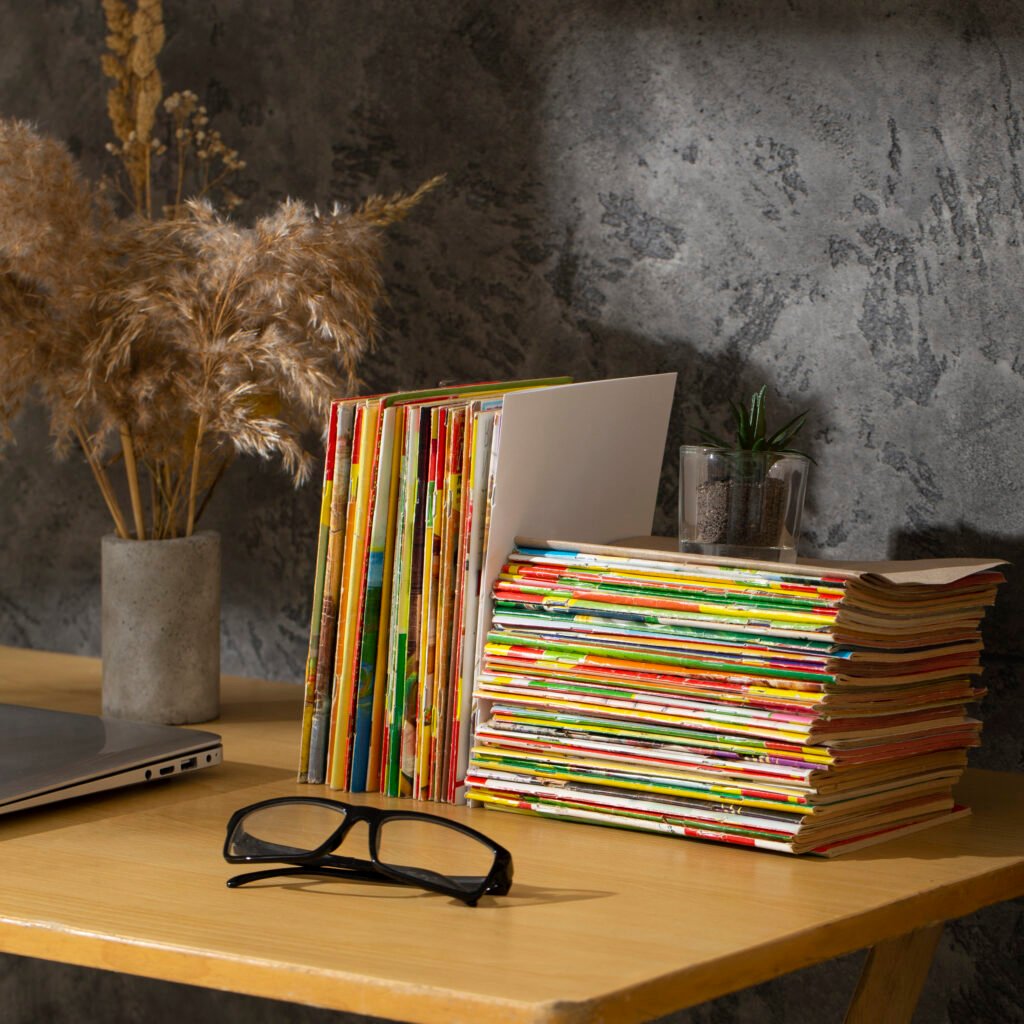 stack-old-coming-book-strips-wooden-desk